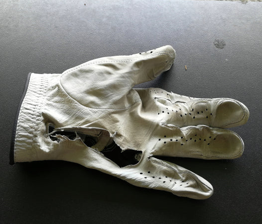 Worn out golf glove